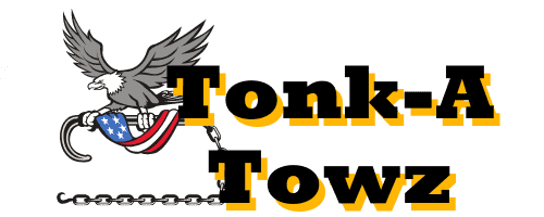 A logo featuring a bald eagle gripping a towing hook adorned with the American flag, representing our towing company. The text "Tonk-A Towz" is in bold yellow and black, with a chain extending across the bottom, symbolizing strength in emergency roadside assistance.